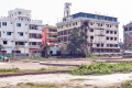 মাদারীপুর শহর: পুকুর ভরাট করে বহুতল ভবন
