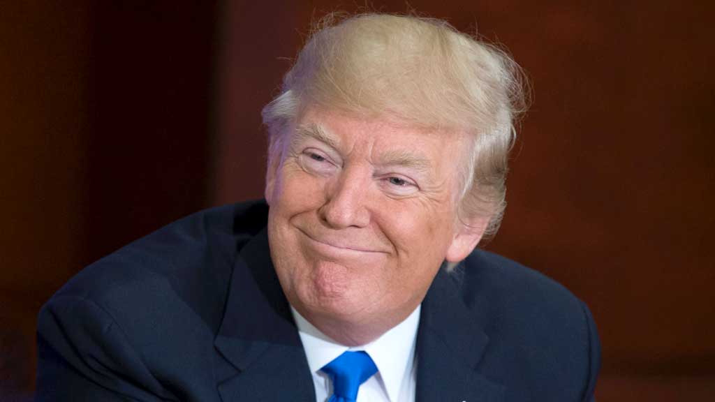 trump-smiling-ajker-patrika