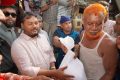 বন্যার্তদের মাঝে ত্রাণ নিয়ে রাসিক প্রশাসক